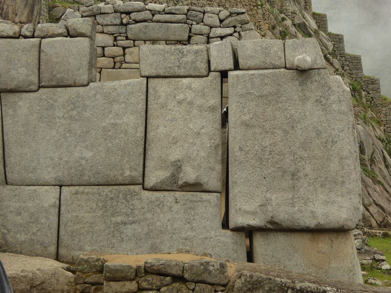 3 in traditional clothes macchu Picchu inca